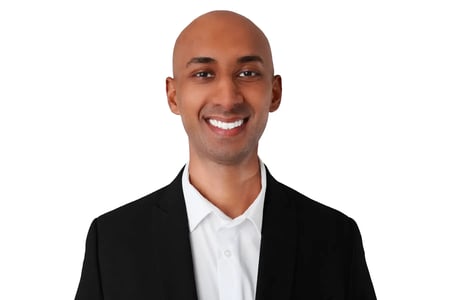 Formal headshot of Dipendra Mistry in a suit, CSO and Managing Partner of MistryX