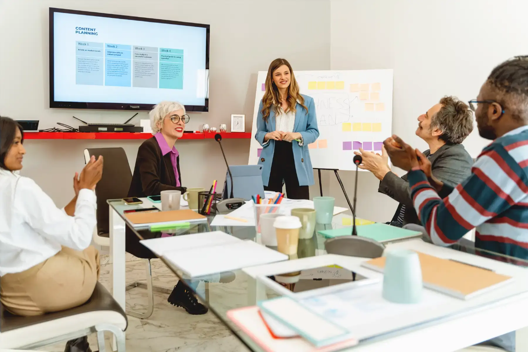 Cross-functional team in a brand strategy workshop aligning on campaign messaging and purpose-led storytelling for healthcare and wellness audiences