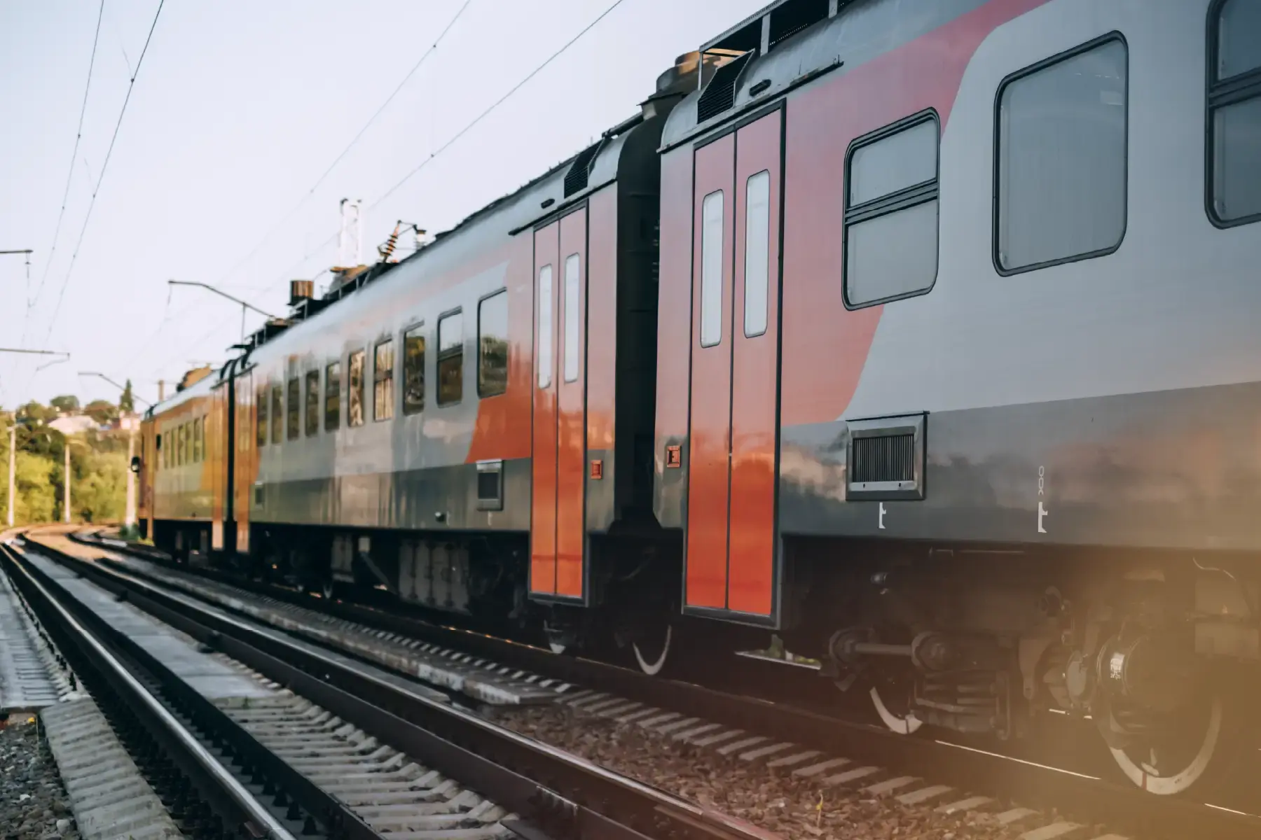 Modern railway train in motion, symbolising innovation and market entry in the transport infrastructure sector
