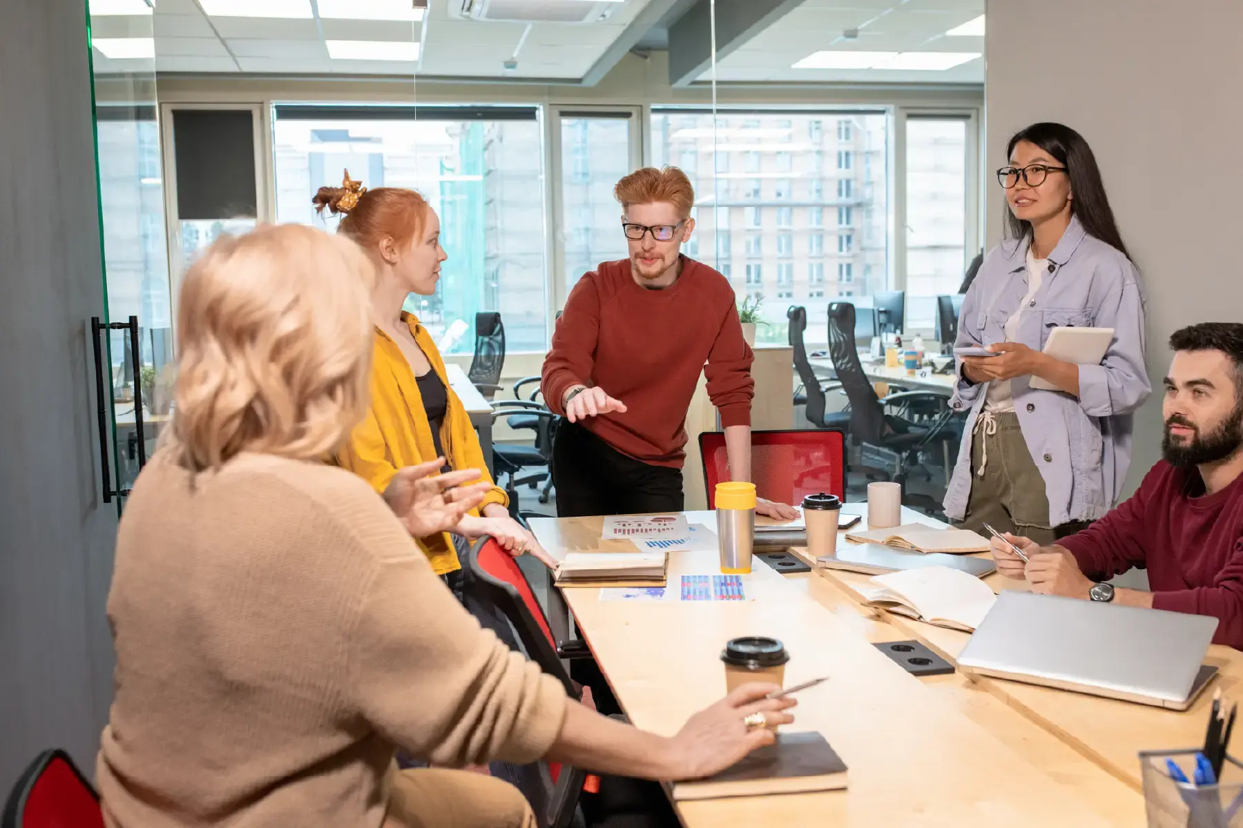 Strategic consulting session with agency leadership and cross-functional teams aligning on messaging, value proposition, and global go-to-market strategy