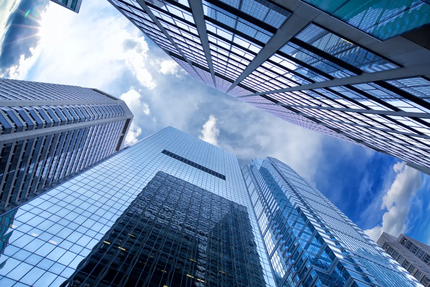 Modern high-rise office buildings symbolising global B2B and professional service environments Modern high-rise office buildings symbolising global B2B and professional service environments